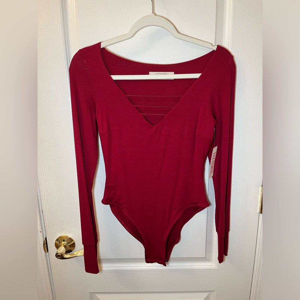 NWT Lucy Love bodysuit